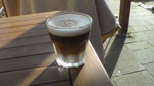 Close-up of coffee cup on table