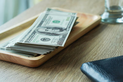 High angle view of coins on table