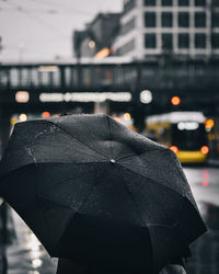 Close-up of car on street during rainy season