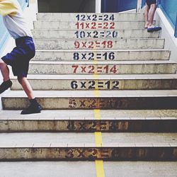 Woman standing on steps