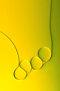 Close-up of bubble on yellow background