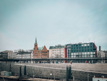 Buildings in city against sky