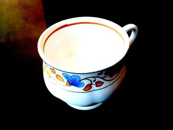 Close-up of coffee cup on table