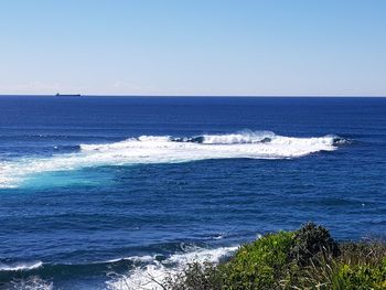 Scenic view of sea against clear sky