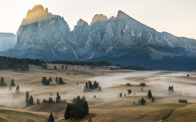 Scenic view of  mountain peaks against sky