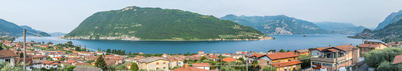 Extra wide view of monte isola in the lake iseo