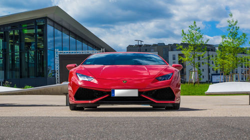 Red car against sky