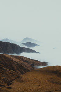 Road through the mountains and clouds