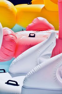 High angle view of inflatable pool rafts in swimming pool