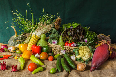 Still life vegetables, herbs and fruit as ingredients in cooking.