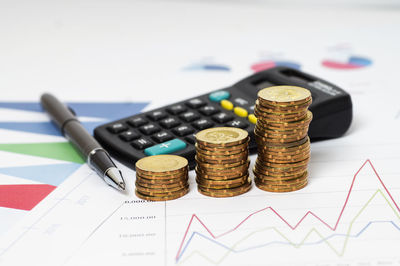 Close-up of coins on table