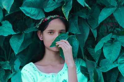 Portrait of girl with leaves