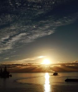 Scenic view of sea at sunset