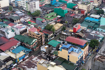 High angle view of street amidst buildings in city
