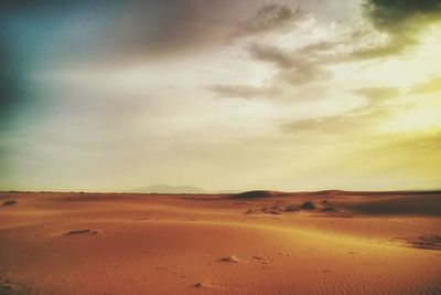 Scenic view of desert against sky