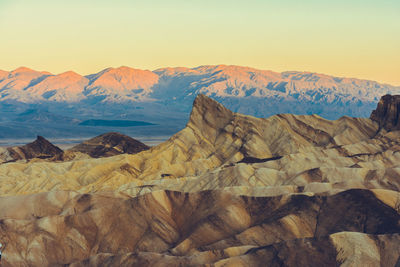 Scenic view of mountains against sky during sunset