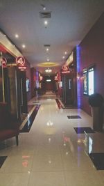 Illuminated corridor of building