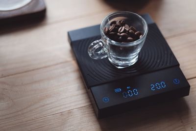 High angle view of coffee served on table