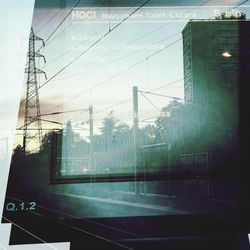 View of building seen through wet window