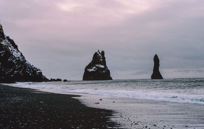 Scenic view of sea against sky at sunset