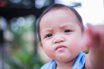 Portrait of cute baby looking away