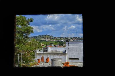 View of building against cloudy sky