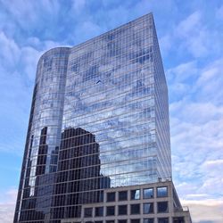Low angle view of skyscraper against sky