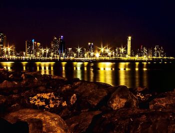 Bridge over river at night