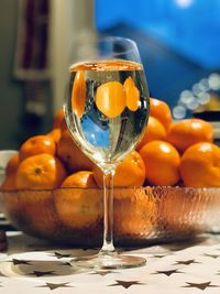 Close-up of orange juice in glass on table