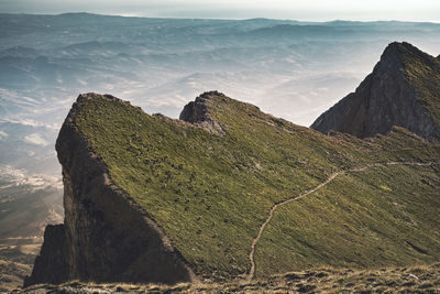 Panoramic view of rocks and mountains against sky