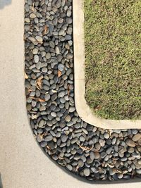 High angle view of stone stack on wood