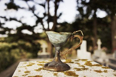 Chalice on retaining wall