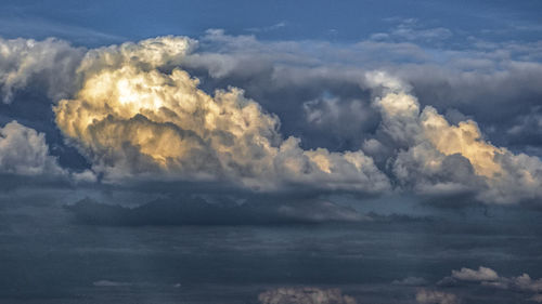 Scenic view of sea against blue sky