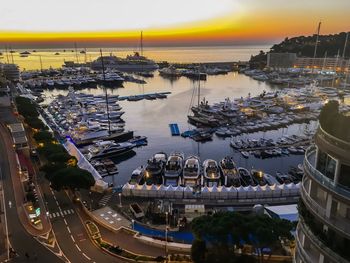 High angle view of harbor at sunset