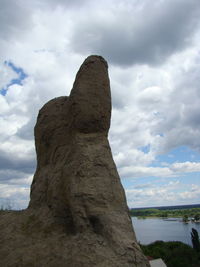 Low angle view of rocks against sky