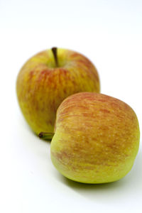 Close-up of fruits against white background