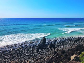 Scenic view of sea against clear sky