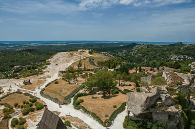 Panoramic view of the castle of baux-de-provence at the top of the hill, france.