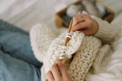 Teengirl knitting at home. handmade and hobby.