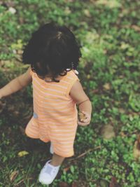 Baby boy walking outdoors