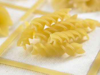 Close-up of pastas on fabric