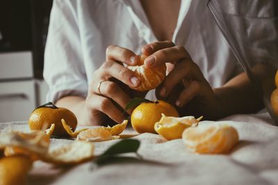 Close-up of man preparing food