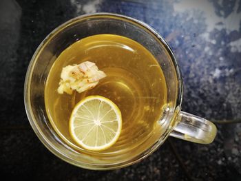 High angle view of tea in glass on table