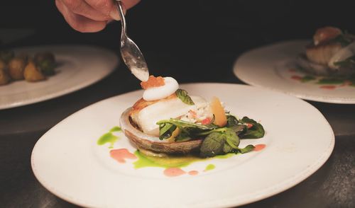 Close-up of hand served in plate