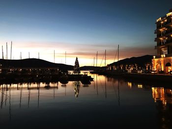 Silhouette of marina at sunset