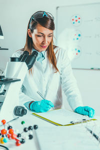 Young woman working in laboratory