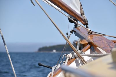 Close-up of rope against the sea