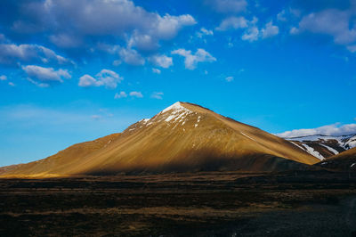 Scenic view of desert against sky