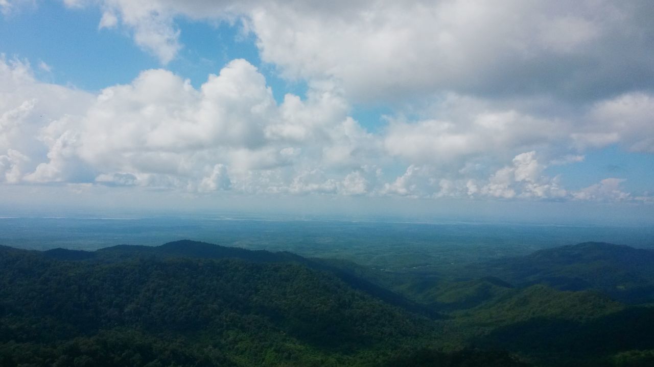 tranquil scene, scenics, tranquility, beauty in nature, mountain, sky, landscape, nature, cloud - sky, mountain range, idyllic, non-urban scene, cloud, cloudy, tree, day, remote, outdoors, high angle view, no people