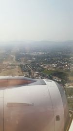 Aerial view of city against sky